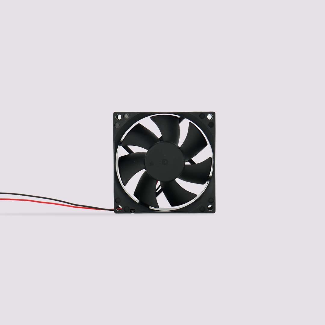 Black square motherboard fan with red and black wires